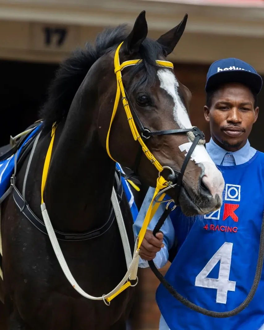 The people closest to the horse.